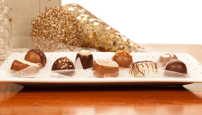 A tray of custom chocolates at a party.